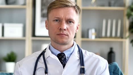 portrait of serious confident doctor