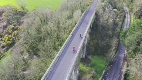 cyclists on the waterford cycling over a viaduct close to dungarvan