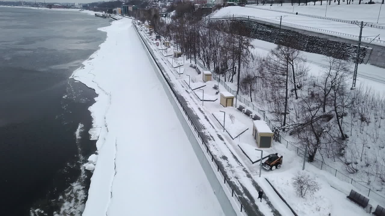 Snowy City Riverfront Park with Snow Removal