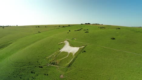 alton barnes white horse milk hill iconic chalk figure landmark aerial rising reverse view