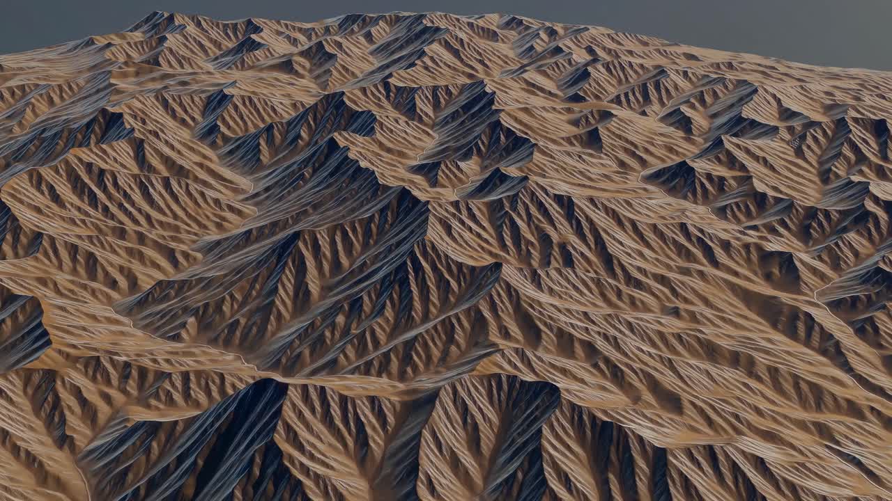 Aerial view of rugged desert mountains, showcasing intricate textures and shadows