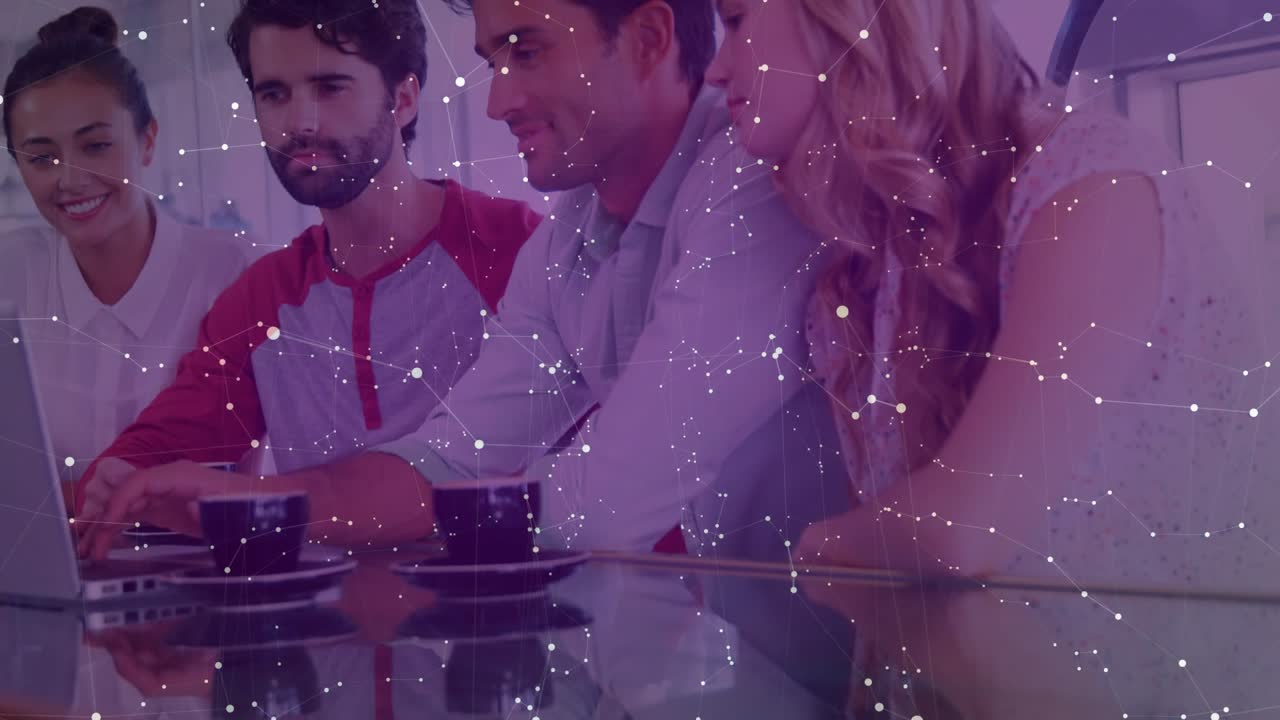 Man opening laptop and tapping keys triggers IT team reviewing live data values with graphic panels