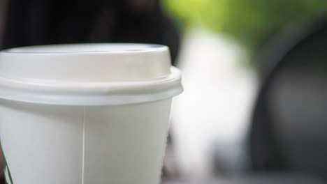 close-up of a disposable coffee cup