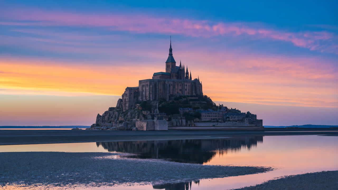 Mont Saint-Michel at Sunset with Reflections