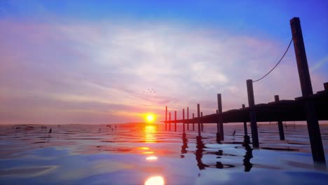 sunset over a wooden pier