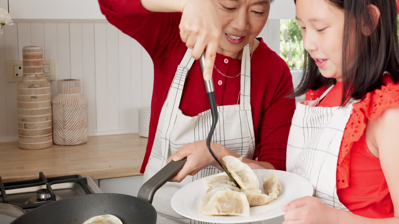 Family, children and cooking dumplings