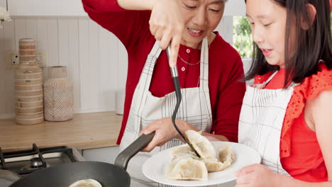 Family,-children-and-cooking-dumplings