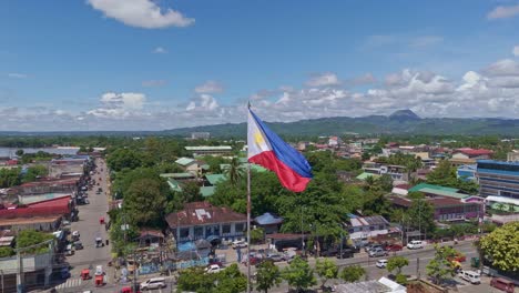 philippine flag flying high over butuan city caraga mindanao philippines
