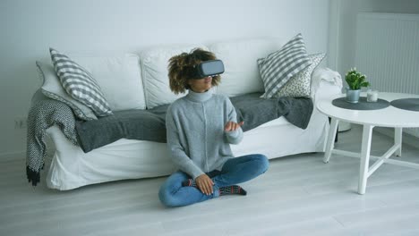 woman in vr glasses at home