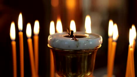 church candles burn close up