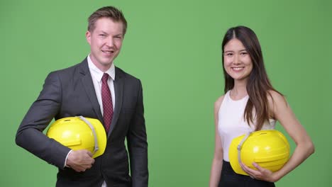 multi-ethnic business couple as engineers together