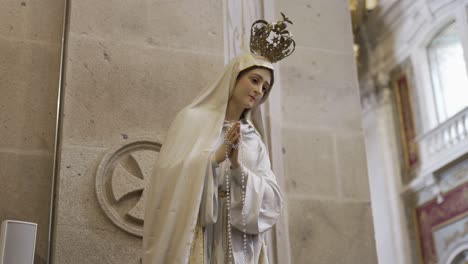 statue of the virgin mary in a church