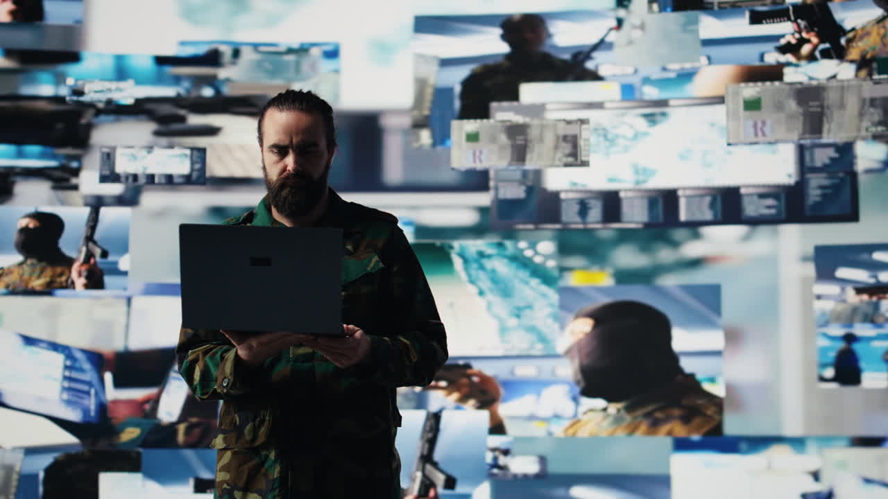 Defense forces officer reviews surveillance and digital systems
