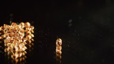 gold rivets of a scythian priestess 2000 years old, an old earring, a spinning wheel, found during excavations. vintage jewelry. religion. close-up