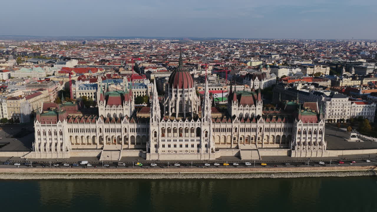Perfectly centered aerial capture of the Hungarian Parliament’s grand dome and ornate spires facing the Danube River