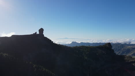 Roque-Bentayga-view-from-Mirador-de-Degollada-Becerra,-in-the-background-Island-of-Tenerife-and-Mount-Teide,-Canary-Island,-time-lapse,-4K