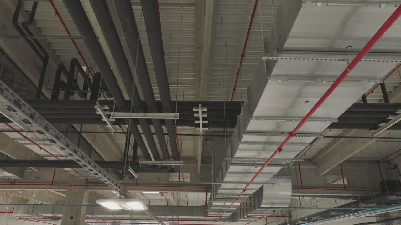 Building Ceiling with Pipes, Ducts, and Electrical Conduits