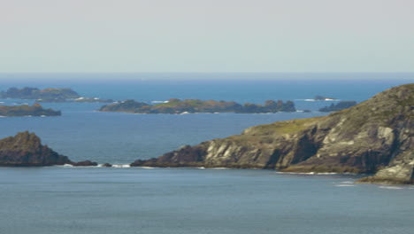 establishing view of sensational coastline in dingle, ireland, pan, sunny day