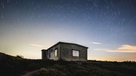 Sunset-star-lapse-of-building-on-Sunset-Peak-Lantau-Island-Hong-Kong