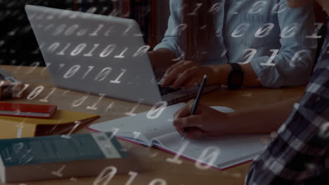 Animation of binary coding numbers changing over students writing and using laptop
