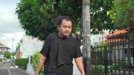 man walking outside in the city