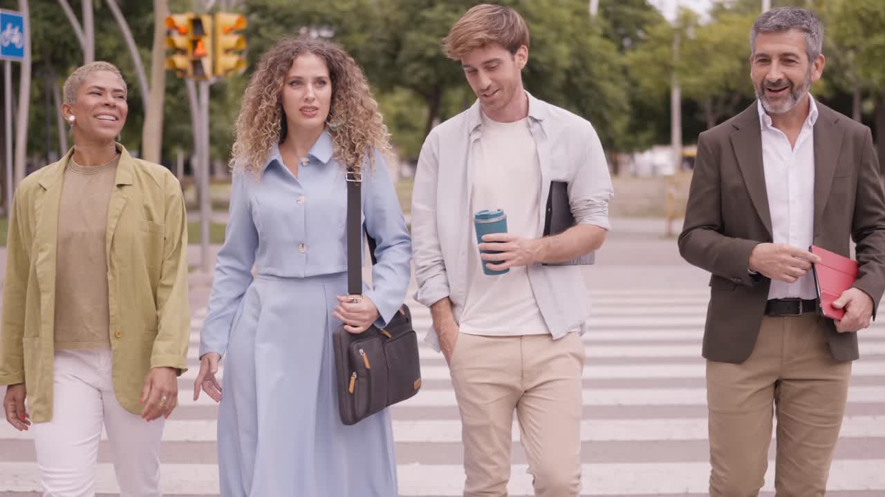 Group of Professionals Walking Across a Crosswalk