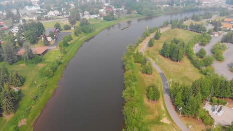 4K-Drone-Video-of-the-Chena-River-running-through-Downtown-Fairbanks,-Alaska-during-Summer-Day