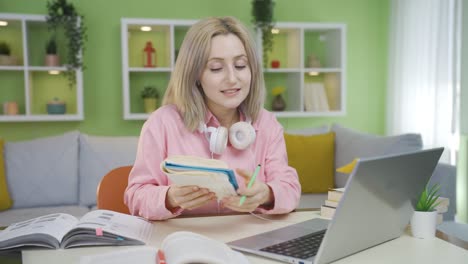 University-student-girl-studying-with-her-friend-by-video-call.