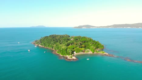 aerial paradise island shot as camera rises up