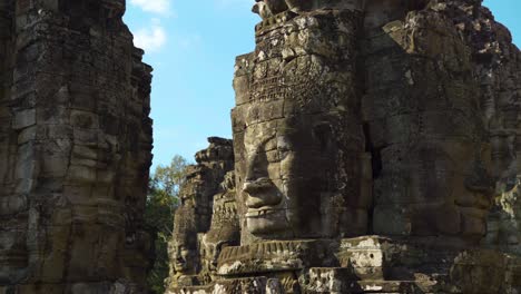 closeup carved faces of bayon temple, angkor, cambodia