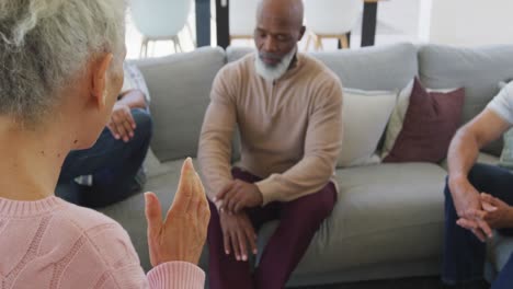 Senior-diverse-people-at-meeting-talking-at-retirement-home