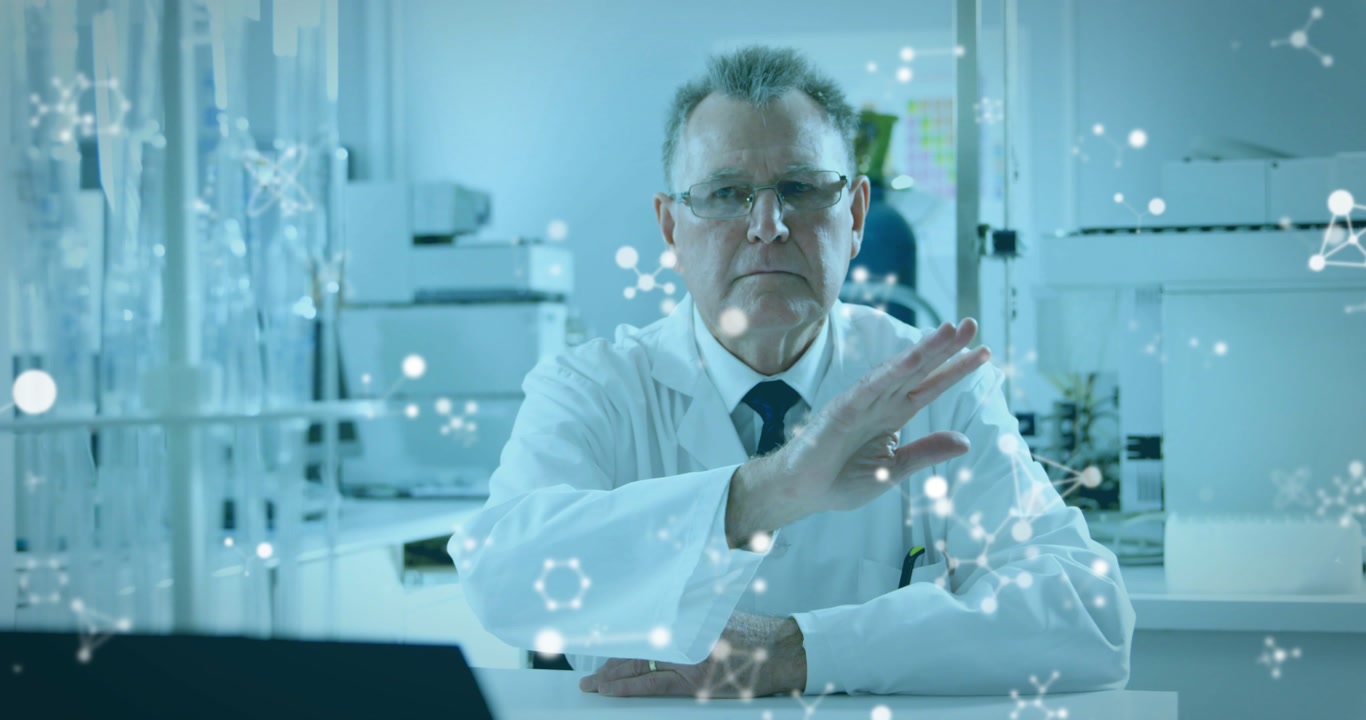Senior scientist raising hand and sweeping molecular overlay, nodes moving around palm for science
