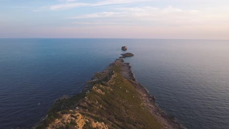 epic cinematic aerial 4k footage of the coastline of the balearic island mallorca at sunset on a summer day