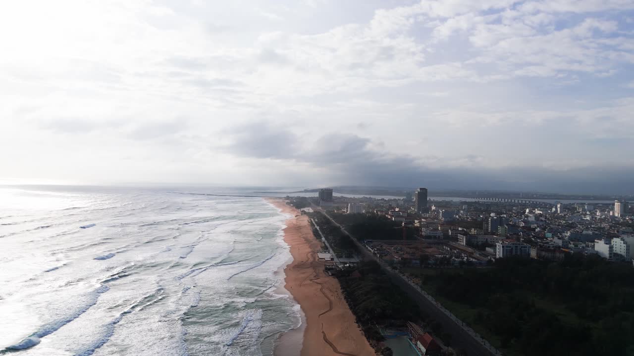 Aerial View Pan of the Beautiful Beach in Tuy Hoa in the morning.
