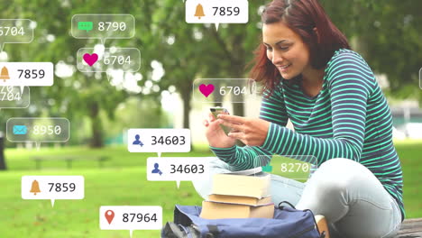 animación de iconos de las redes sociales contra una mujer biracial sonriendo mientras usa un teléfono inteligente en el parque