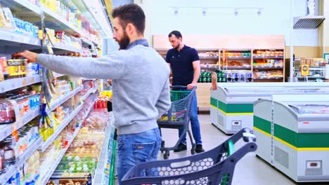 family shopping experience in a grocery store: parents and children engaging with fresh produce and packaged goods aisle together in a vibrant supermarket environment