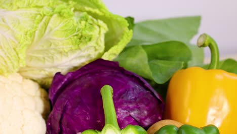 assorted vegetables arranged on a white background