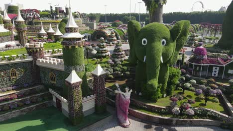 Drone-view-of-Miracle-Garden,-the-largest-natural-flower-garden-in-the-world-with-over-150-million-flowers-of-more-than-120-varieties