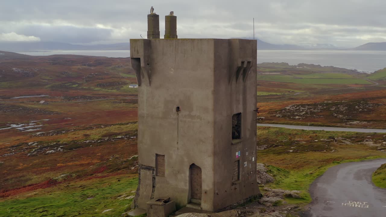 Aerial orbit of Malin Signal Tower revealing a beautiful autumn morning landscape