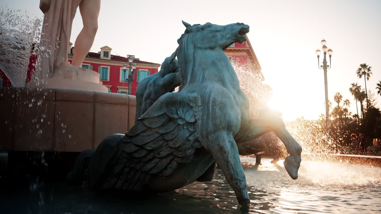 Nice, France - October 8, 2024: Close up of the Fontaine du Soleil in Place Massena at sunset