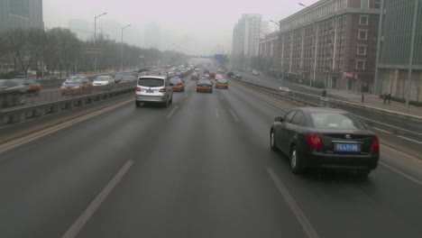 taxis and vehicles travel along busy roads in china 1