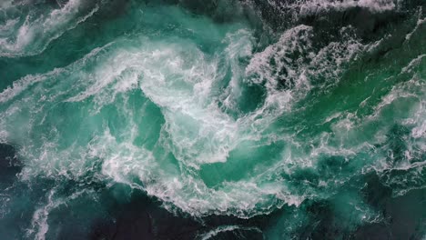 waves of water of the river and the sea meet each other during high tide and low tide.