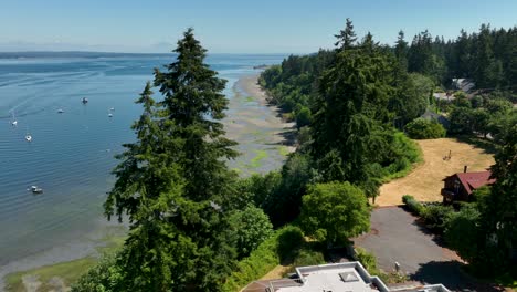 Aerial-of-Langley's-shoreline-at-low-tide-with-boats-gloating-in-the-bay