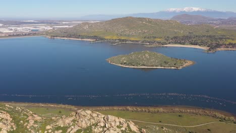 Slow-pan-drone-flight-over-looking-Lake-Perris-2-of-2