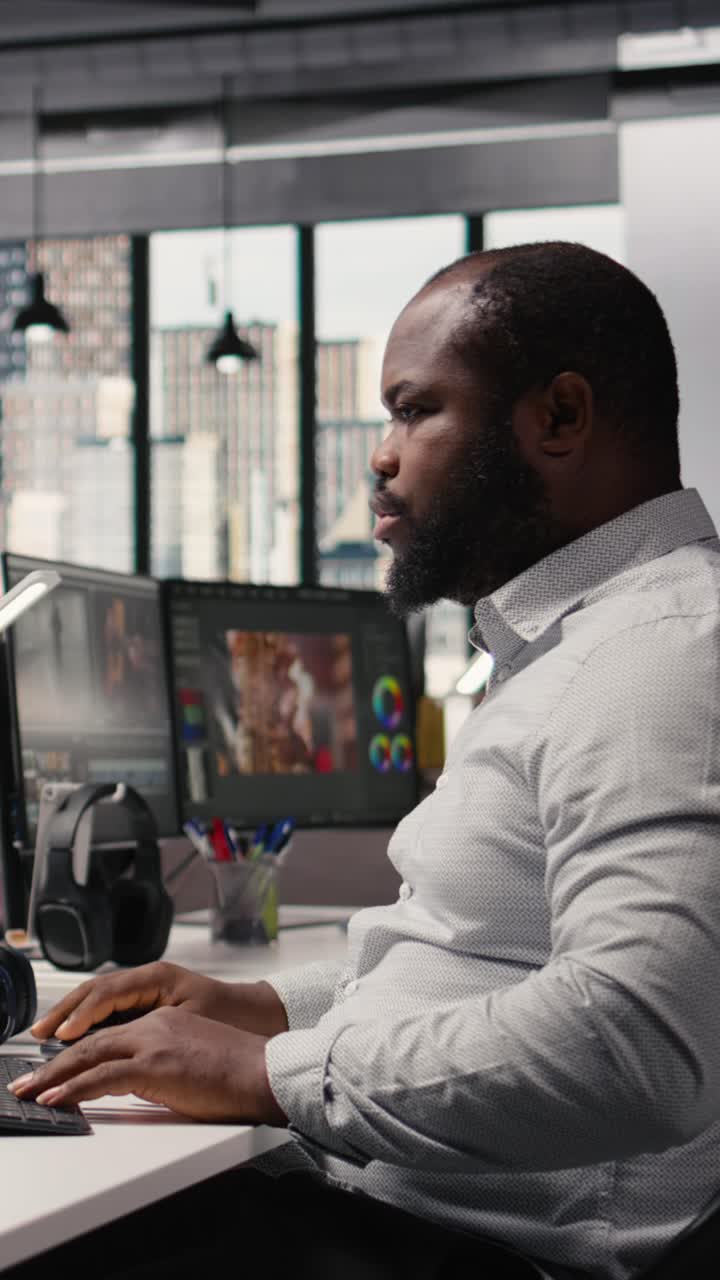 Vertical Video African American Filmmaker Editing Video Footage For Content Production