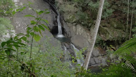 Cascade-Through-Smooth-Sloping-Rocks---Currumbin-Rockpools-At-Currumbin-Valley-In-Queensland,-Australia