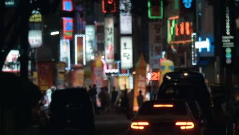 night street with illuminated banners in seoul south korea