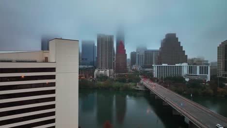 austin skyline covered with low clouds at dusk in texas, usa