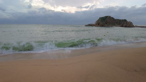 hi, in super slow motion on a beach, cloudy road with no people, sand, thick