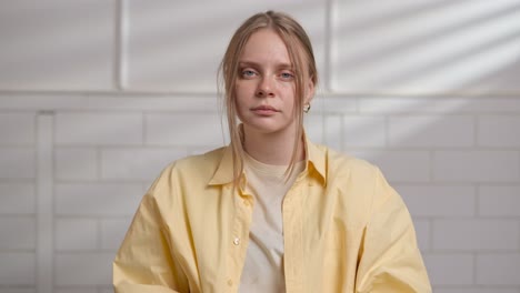 woman in a yellow shirt